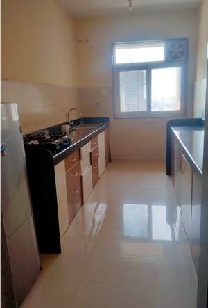 Kitchen in 2 BHK Apartment at Raheja Vistas Premiere, Mohammadwadi – for Rent