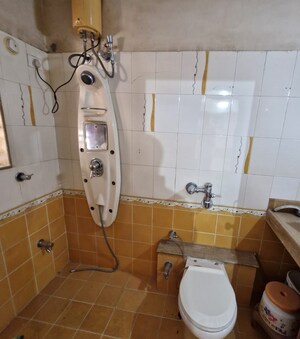 Bathroom in 3 BHK Apartment at Green Valley CHS, Wanwadi – for Sale