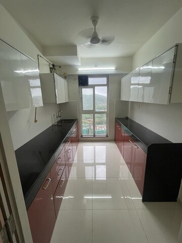 Kitchen in 3 BHK Apartment at Godrej Emerald, Ghodbunder Road – for Rent