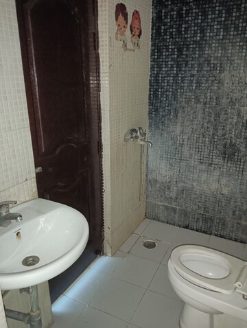 Attached Bathroom in 2 BHK Apartment at Gulmohur Garden, Raj Nagar Extension – for Rent