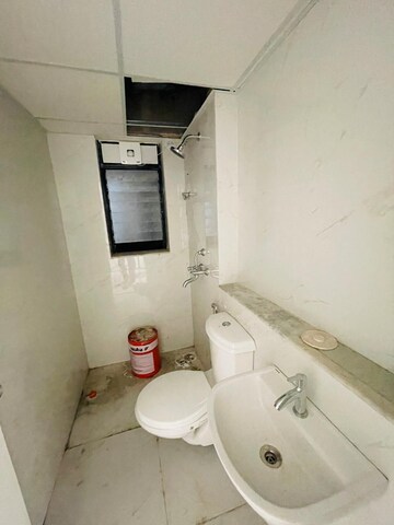 Bathroom in 2 BHK Apartment at Runwal Gardens, Dombivli East – for Rent