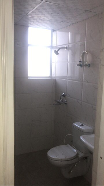 Bathroom in 2 BHK Apartment at Adore Ananda, Sector 64 – for Sale