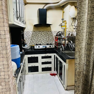 Kitchen in 2 BHK Apartment at SVP Gulmohur Garden, Raj Nagar Extension – for Sale