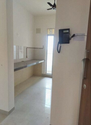 Kitchen in 2 BHK Apartment at Piramal Vaikunth, Balkum Pada – for Rent