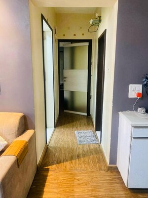 Living Room in 2 BHK Apartment at Lotus Sky Garden, Malad West – for Sale