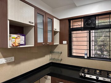 Kitchen in 2 BHK Apartment at Hiranandani Estate Queens, Ghodbunder Road – for Rent
