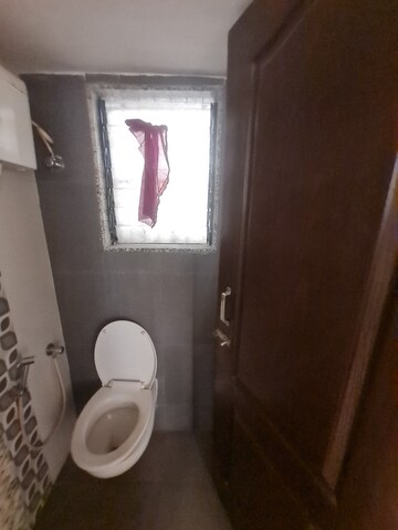 Bathroom in 1 BHK Apartment at Deeplaxmi Shreeji Meadows, Katrap – for Rent