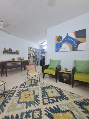 Living Room in 2 BHK Apartment at Utopia Garden Grove Mall, Borivali West – for Sale