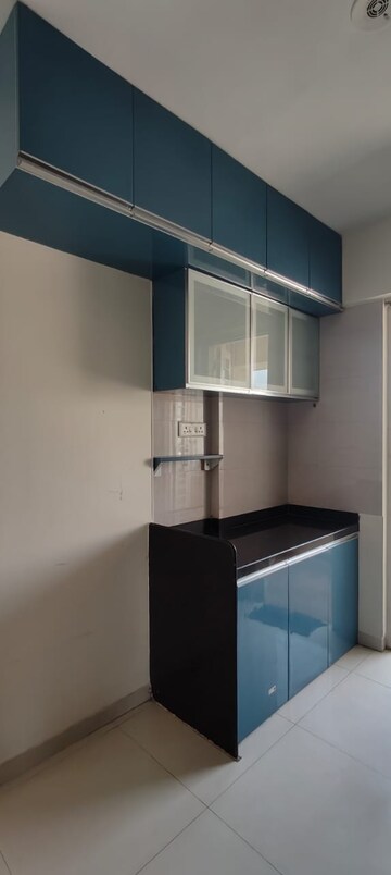 Kitchen in 2 BHK Apartment at Unique Lifestyle, Wagholi – for Rent