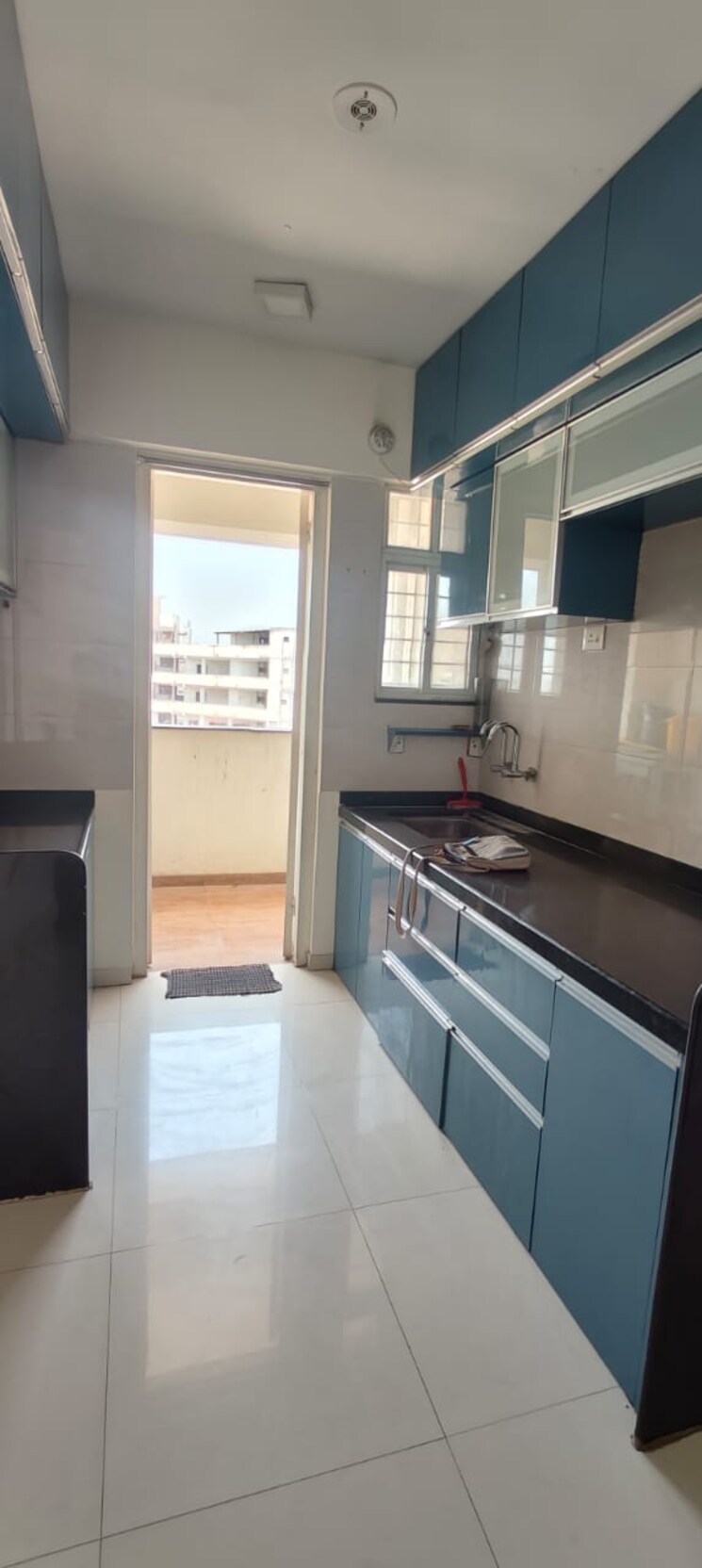 Kitchen, unique-lifestyle 2 Bedroom 740 Sq.Ft. Apartment In Wagholi Pune 8510101