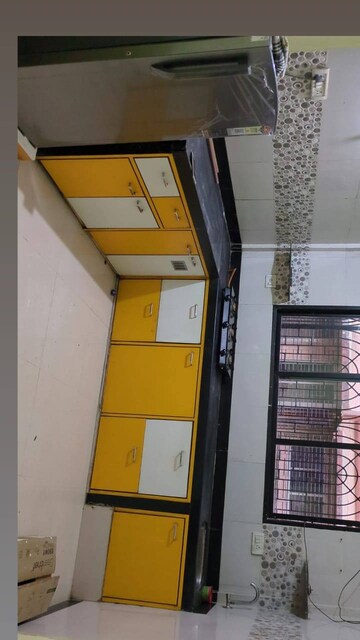 Kitchen in 1 BHK Apartment at Omkar Vive, Kurla – for Rent
