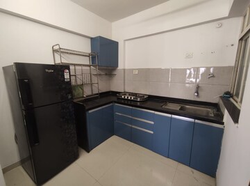 Kitchen in 1.5 BHK Apartment at Porwal Parklane Premier, Wagholi – for Rent