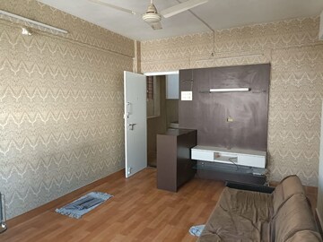 Living Room in 2 BHK Apartment at Madhavbaug Society, Bhusari Colony – for Rent