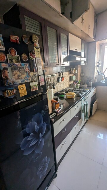 Kitchen in 2 BHK Apartment at Royal Classic Co Op Society, Andheri West – for Rent