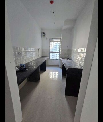 Kitchen in 2 BHK Apartment at Kalpataru Immensa, Kolshet Road – for Rent