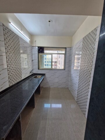 Kitchen in 1 BHK Apartment at Mohan Willows, Badlapur East – for Sale