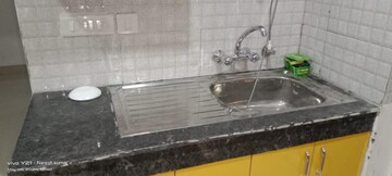 Kitchen in 2 BHK Apartment at Aarcity Regency Park, Sector 16c Greater Noida – for Rent