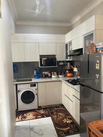 Kitchen in 3 BHK Apartment at Central Park Flower Valley Aqua Front Towers, Sohna Sector 33 – for Rent