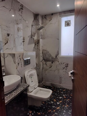 Bathroom in 3 BHK Apartment at DLF Hamilton Court, Sector 27 – for Sale