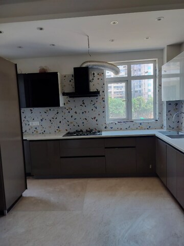 Kitchen in 3 BHK Apartment at DLF Hamilton Court, Sector 27 – for Sale