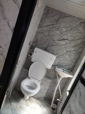 Bathroom in 2 BHK Apartment at Vasant Park CHS, Vasai West – for Sale