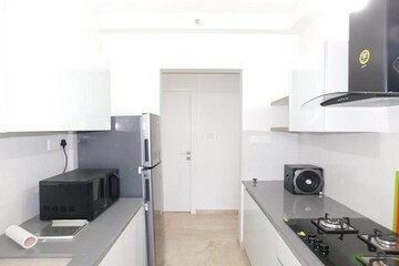 Living Room in 1 BHK Apartment at Godrej The Trees, Vikhroli East – for Rent