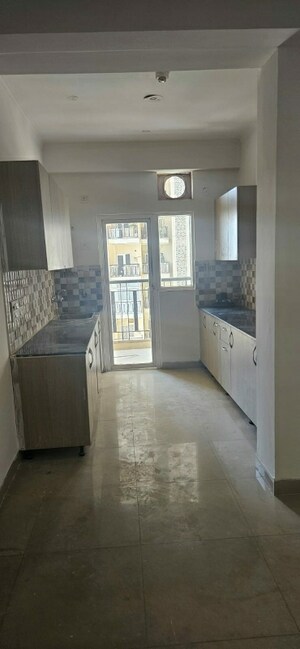 Kitchen in 2 BHK Apartment at JKG Palm Resort, Raj Nagar Extension – for Sale