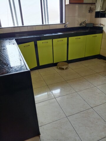 Kitchen in 3 BHK Penthouse at NRI Complex Phase I, Seawoods Sector 58 – for Rent