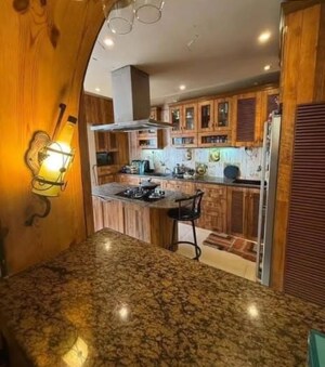 Kitchen in 3 BHK Penthouse at Bramhacorp Emerald County, Kondhwa – for Sale