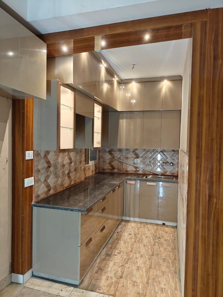 Kitchen, amrapali-golf-homes 3 Bedroom 1115 Sq.Ft. Apartment In Haibatpur Greater Noida 8511412