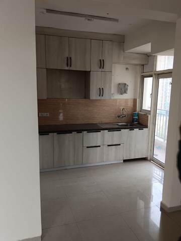 Kitchen in 3.5 BHK Apartment at Omaxe R2, Gomti Nagar – for Rent