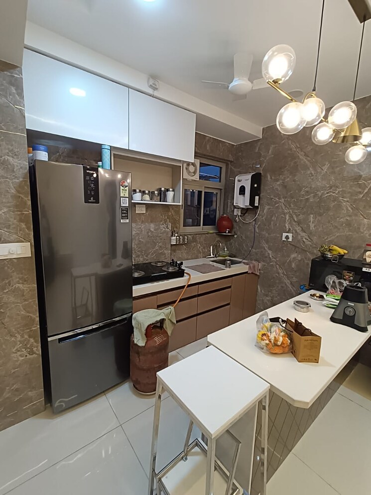 Kitchen, shapoorji-pallonji-astron 2 Bedroom 631 Sq.Ft. Apartment In Kandivali East Mumbai 8511504