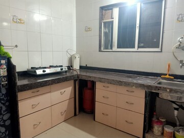 Kitchen in 1 BHK Apartment at Goodwill Galaxy, Dhanori – for Rent