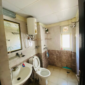 Bathroom in 3 BHK Apartment at Gardenia Golf City, Noida Central – for Rent