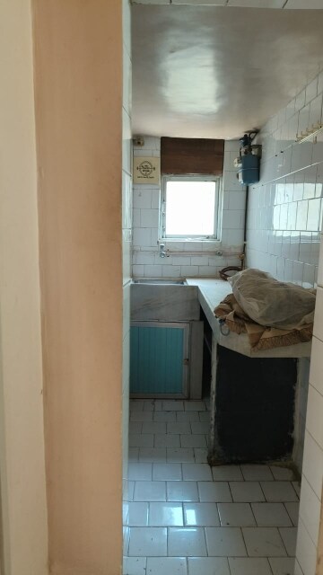 Kitchen in 1 BHK Apartment at Rajesh Park View, Santacruz East – for Rent