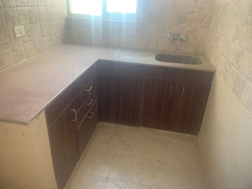 Kitchen in 3 BHK Apartment at Amrapali Golf Homes, Sector 4, Greater Noida – for Rent