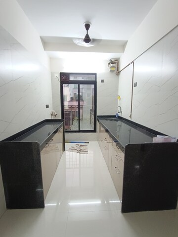 Kitchen in 2 BHK Apartment at Ashwin CHS, Borivali West – for Rent