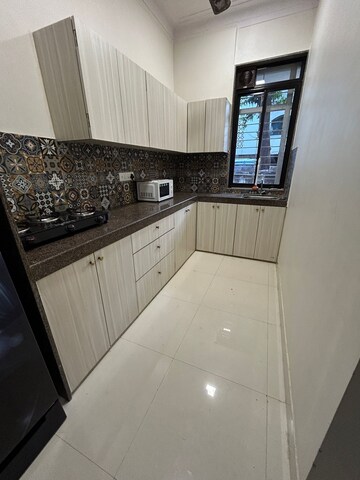 Kitchen in 1 BHK Apartment at Bandra West – for Rent