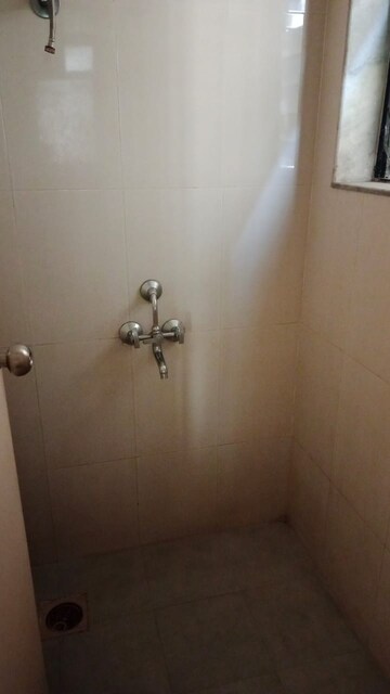 Bathroom in 1 BHK Apartment at Lodha Crown Taloja Quality Homes, Dombivli East – for Rent