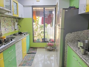 Kitchen in 2 BHK Apartment at Unnathi Woods Phase 1 And 2, Ghodbunder Road – for Sale