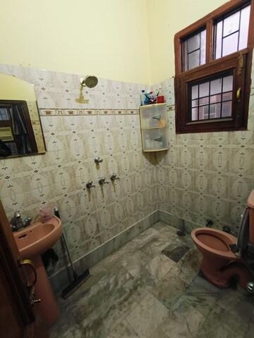Bathroom in 2 BHK Apartment at Sunny Enclave – for Rent