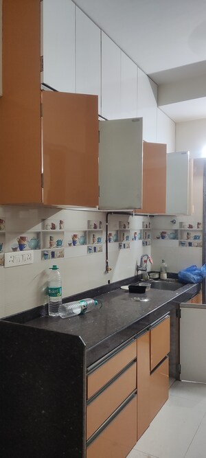 Kitchen in 2 BHK Apartment at Abrol Avirahi Heights, Malad West – for Sale