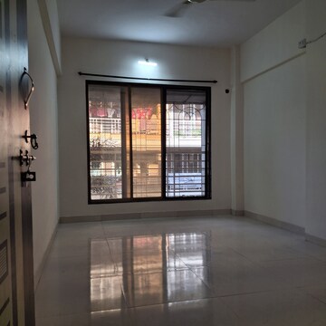 Living Room in 1 BHK Apartment at Kopar Khairane – for Rent