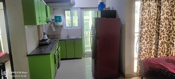 Kitchen in 2 BHK Apartment at Aims Golf City, Sector 75 – for Rent