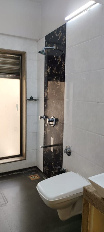 Bathroom in 3 BHK Apartment at Dhaval Sunrise Orlem, Malad West – for Sale