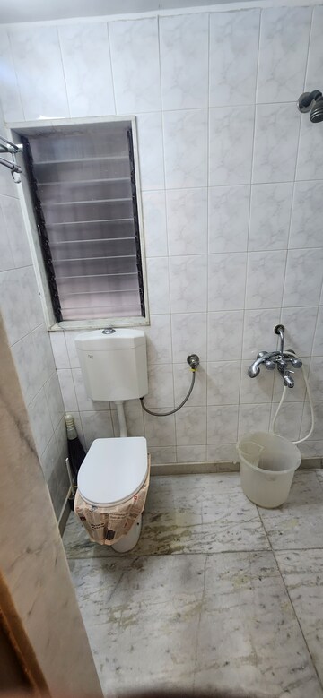 Attached Bathroom in 2 BHK Apartment at Silver Sand CHS, Andheri West – for Rent