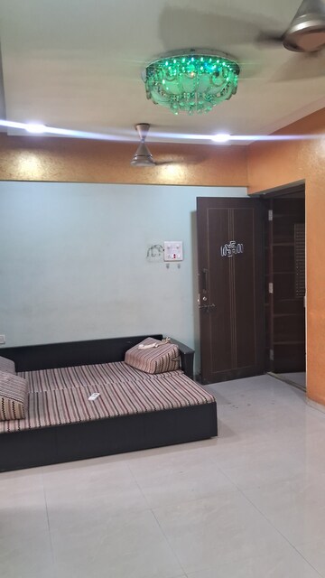 Living Room in 1 BHK Apartment at Sai Proviso Dhanishta, Kopar Khairane – for Rent
