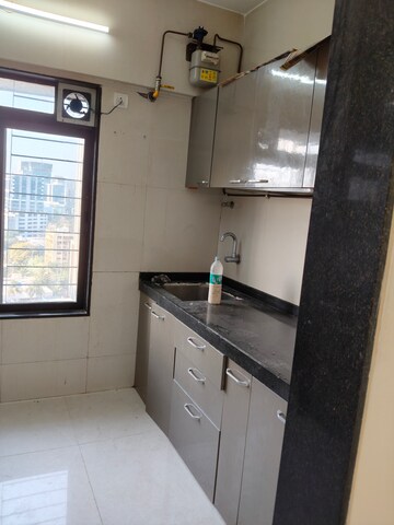 Kitchen in 2 BHK Apartment at Suryakiran CHS, Andheri West – for Rent