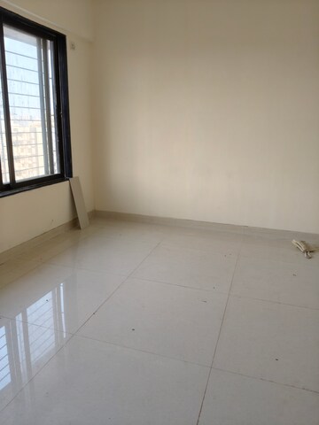 Room in 2 BHK Apartment at Suryakiran CHS, Andheri West – for Rent