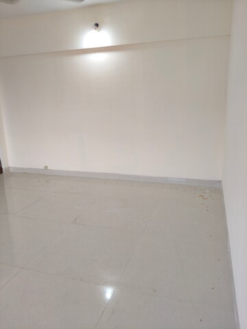 Room in 2 BHK Apartment at Suryakiran CHS, Andheri West – for Rent